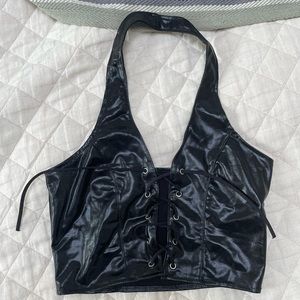 Shiny black lace up halter top